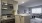 a kitchen with a stove and oven