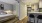 a bedroom with a bed and a table