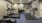 a room with a treadmill and bench