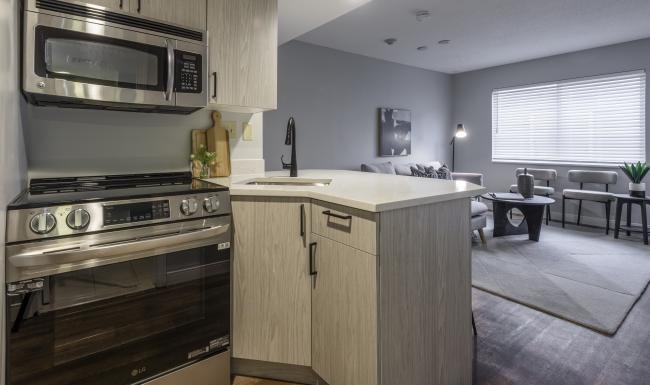 a kitchen with a stove and oven